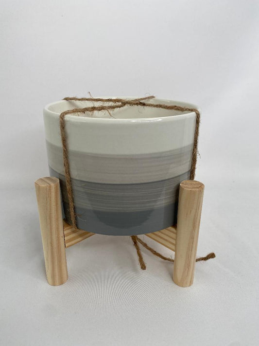 Gray Striped Ceramic Planter on Wood Stand