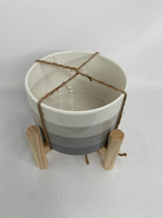 Gray Striped Ceramic Planter on Wood Stand